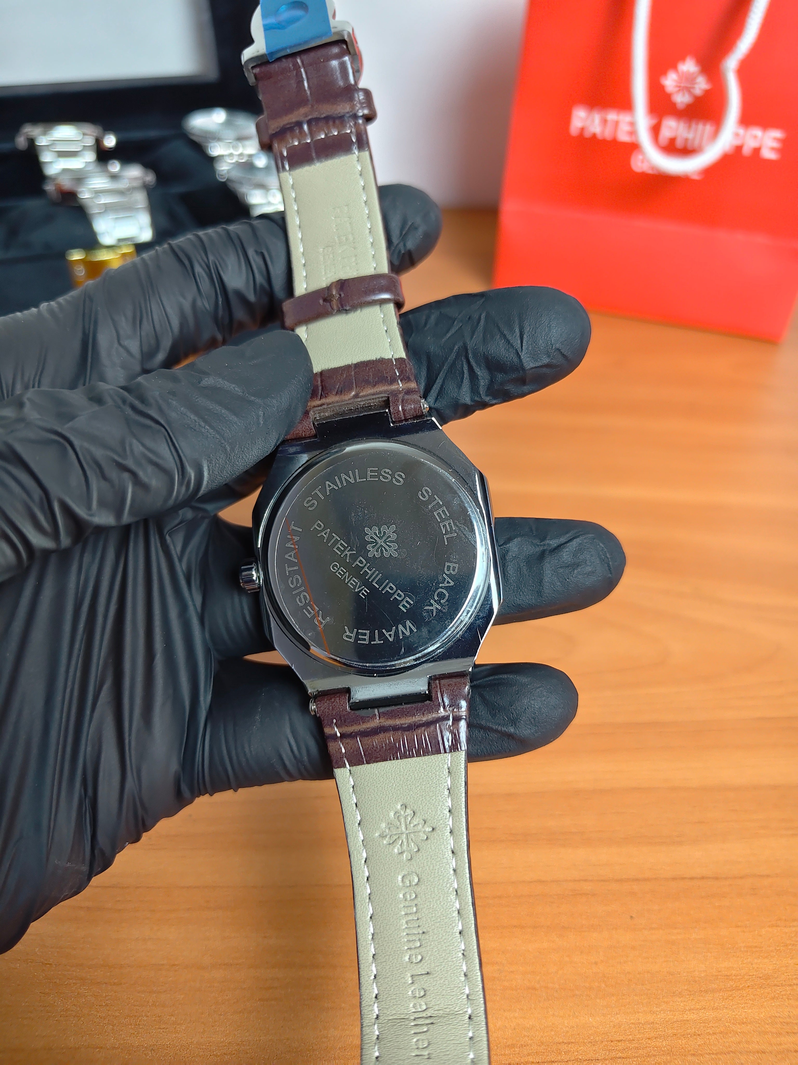 Patek Philippe Men's Watch – Roman Dial Black Leather Strap