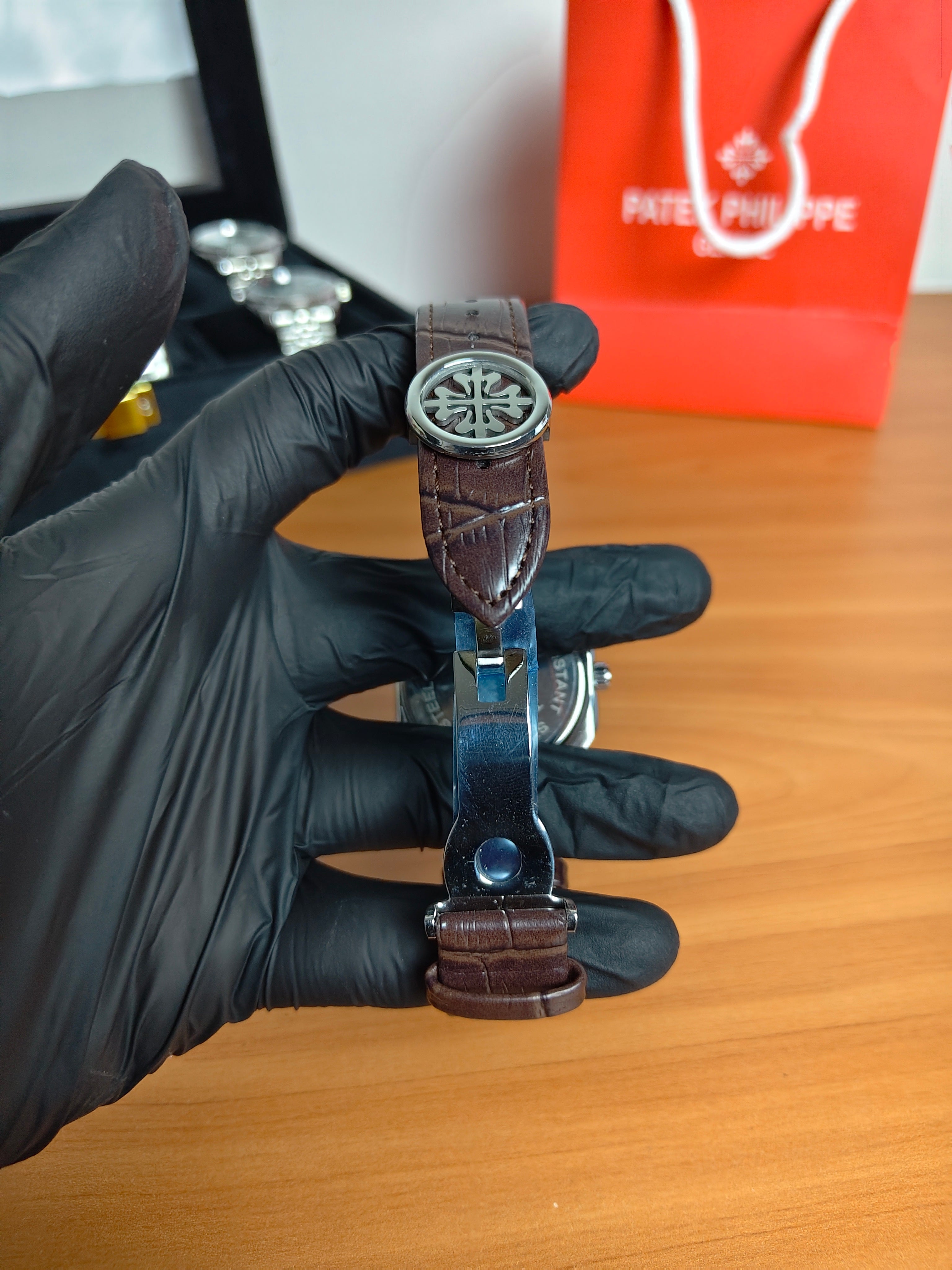 Patek Philippe Men's Watch – Roman Dial Black Leather Strap